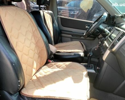 Черный Ниссан ИксТрейл, объемом двигателя 2.5 л и пробегом 295 тыс. км за 6890 $, фото 25 на Automoto.ua