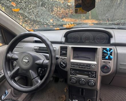 Черный Ниссан ИксТрейл, объемом двигателя 2.2 л и пробегом 306 тыс. км за 2379 $, фото 8 на Automoto.ua