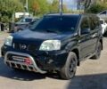 Чорний Ніссан ІксТрейл, об'ємом двигуна 2.5 л та пробігом 295 тис. км за 6890 $, фото 1 на Automoto.ua
