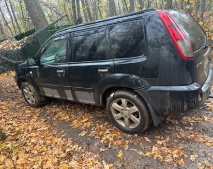 Черный Ниссан ИксТрейл, объемом двигателя 2.2 л и пробегом 306 тыс. км за 2379 $, фото 2 на Automoto.ua