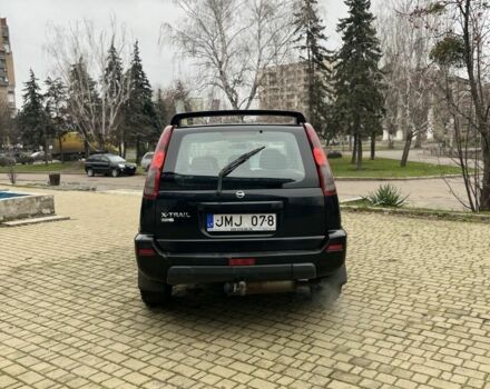 Чорний Ніссан ІксТрейл, об'ємом двигуна 2.2 л та пробігом 200 тис. км за 2600 $, фото 4 на Automoto.ua