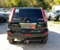 Чорний Ніссан ІксТрейл, об'ємом двигуна 2.5 л та пробігом 295 тис. км за 6890 $, фото 5 на Automoto.ua