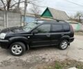 Черный Ниссан ИксТрейл, объемом двигателя 2.2 л и пробегом 290 тыс. км за 3750 $, фото 6 на Automoto.ua
