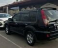 Черный Ниссан ИксТрейл, объемом двигателя 2.5 л и пробегом 261 тыс. км за 8300 $, фото 3 на Automoto.ua