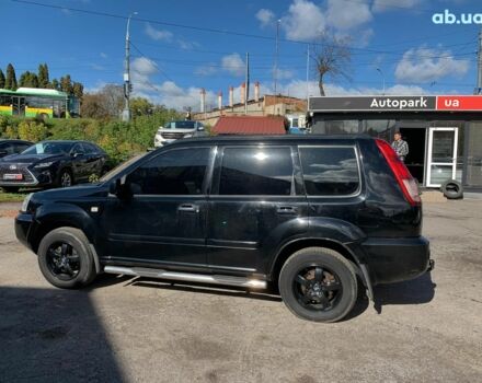 Черный Ниссан ИксТрейл, объемом двигателя 2.5 л и пробегом 295 тыс. км за 6890 $, фото 7 на Automoto.ua