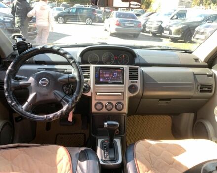 Черный Ниссан ИксТрейл, объемом двигателя 2.5 л и пробегом 295 тыс. км за 6890 $, фото 29 на Automoto.ua