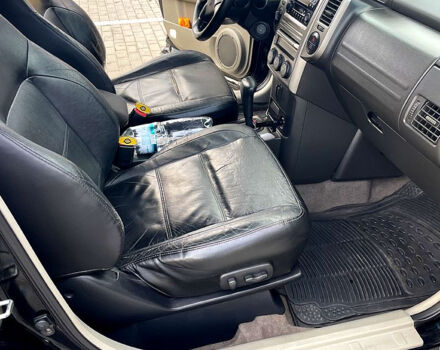 Черный Ниссан ИксТрейл, объемом двигателя 2.5 л и пробегом 280 тыс. км за 7099 $, фото 8 на Automoto.ua