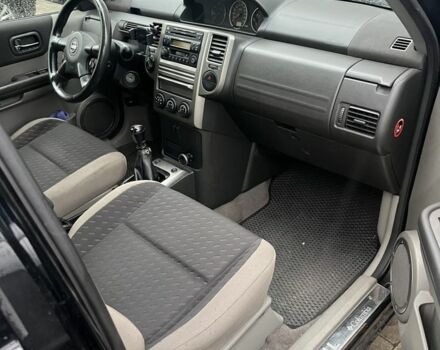 Черный Ниссан ИксТрейл, объемом двигателя 2.2 л и пробегом 206 тыс. км за 4200 $, фото 9 на Automoto.ua