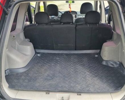 Черный Ниссан ИксТрейл, объемом двигателя 2.18 л и пробегом 210 тыс. км за 6400 $, фото 12 на Automoto.ua