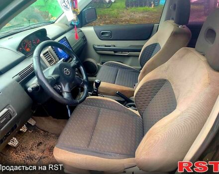 Черный Ниссан ИксТрейл, объемом двигателя 2.2 л и пробегом 248 тыс. км за 3800 $, фото 8 на Automoto.ua