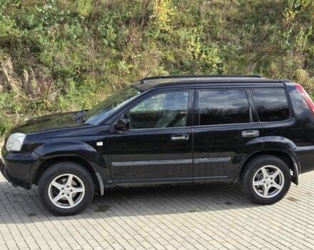 Черный Ниссан ИксТрейл, объемом двигателя 2.2 л и пробегом 220 тыс. км за 2250 $, фото 1 на Automoto.ua