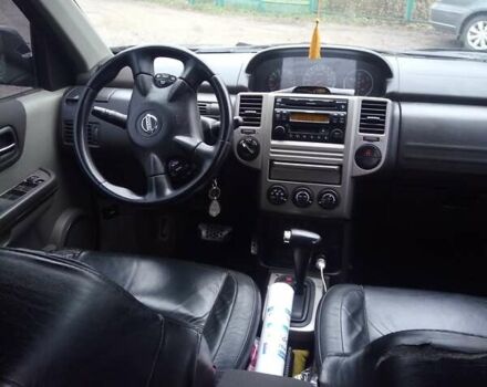 Черный Ниссан ИксТрейл, объемом двигателя 2.5 л и пробегом 202 тыс. км за 6700 $, фото 7 на Automoto.ua