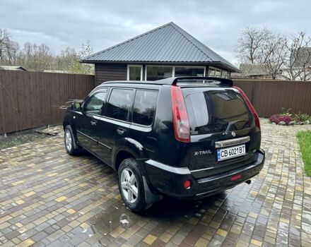 Черный Ниссан ИксТрейл, объемом двигателя 2.2 л и пробегом 168 тыс. км за 6699 $, фото 4 на Automoto.ua