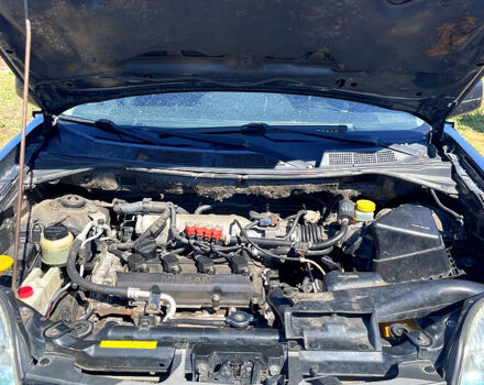 Черный Ниссан ИксТрейл, объемом двигателя 2.5 л и пробегом 280 тыс. км за 7099 $, фото 4 на Automoto.ua