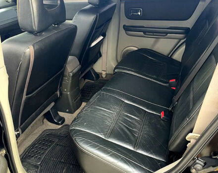 Черный Ниссан ИксТрейл, объемом двигателя 2.5 л и пробегом 280 тыс. км за 7099 $, фото 7 на Automoto.ua