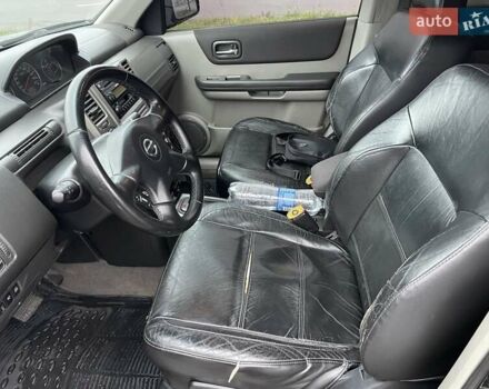 Черный Ниссан ИксТрейл, объемом двигателя 2.5 л и пробегом 285 тыс. км за 6500 $, фото 15 на Automoto.ua