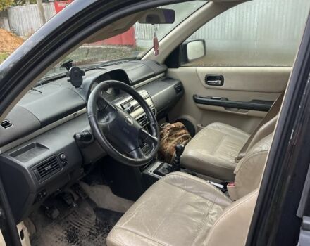 Черный Ниссан ИксТрейл, объемом двигателя 2.2 л и пробегом 327 тыс. км за 3600 $, фото 5 на Automoto.ua