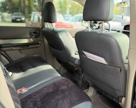 Черный Ниссан ИксТрейл, объемом двигателя 2.2 л и пробегом 360 тыс. км за 7200 $, фото 8 на Automoto.ua