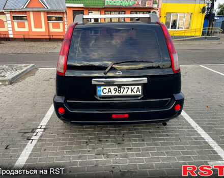 Черный Ниссан ИксТрейл, объемом двигателя 2.5 л и пробегом 280 тыс. км за 7099 $, фото 2 на Automoto.ua