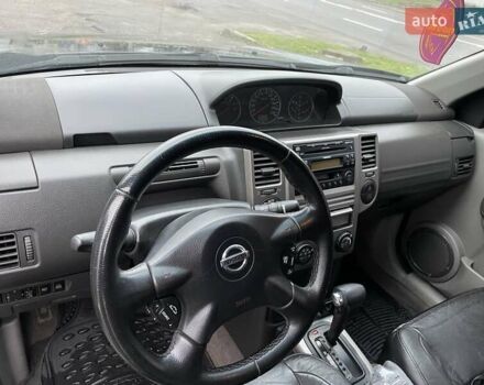 Черный Ниссан ИксТрейл, объемом двигателя 2.5 л и пробегом 285 тыс. км за 6500 $, фото 14 на Automoto.ua