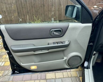 Черный Ниссан ИксТрейл, объемом двигателя 2.2 л и пробегом 168 тыс. км за 6699 $, фото 17 на Automoto.ua