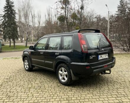 Чорний Ніссан ІксТрейл, об'ємом двигуна 2.2 л та пробігом 200 тис. км за 2600 $, фото 3 на Automoto.ua