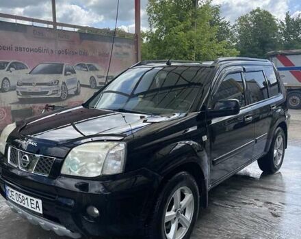 Черный Ниссан ИксТрейл, объемом двигателя 2.2 л и пробегом 300 тыс. км за 7000 $, фото 2 на Automoto.ua