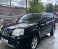 Черный Ниссан ИксТрейл, объемом двигателя 2.2 л и пробегом 300 тыс. км за 7000 $, фото 2 на Automoto.ua