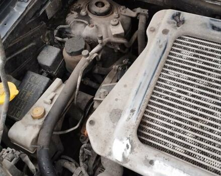 Черный Ниссан ИксТрейл, объемом двигателя 2.2 л и пробегом 373 тыс. км за 5800 $, фото 14 на Automoto.ua