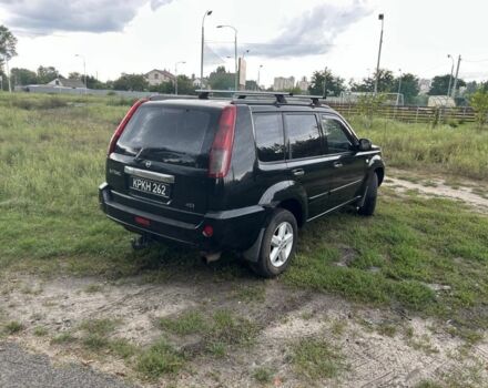 Черный Ниссан ИксТрейл, объемом двигателя 2.2 л и пробегом 252 тыс. км за 3600 $, фото 3 на Automoto.ua