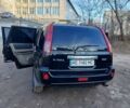 Черный Ниссан ИксТрейл, объемом двигателя 2 л и пробегом 250 тыс. км за 6500 $, фото 1 на Automoto.ua