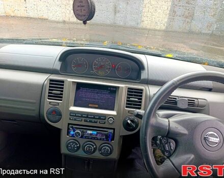 Черный Ниссан ИксТрейл, объемом двигателя 2.2 л и пробегом 180 тыс. км за 4500 $, фото 13 на Automoto.ua