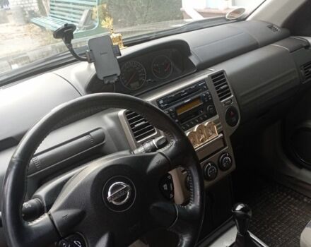 Черный Ниссан ИксТрейл, объемом двигателя 2 л и пробегом 196 тыс. км за 4300 $, фото 4 на Automoto.ua