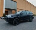 Черный Ниссан ИксТрейл, объемом двигателя 2.2 л и пробегом 250 тыс. км за 2900 $, фото 1 на Automoto.ua