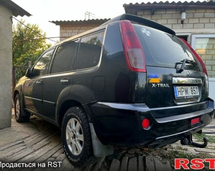 Черный Ниссан ИксТрейл, объемом двигателя 2.2 л и пробегом 360 тыс. км за 3500 $, фото 3 на Automoto.ua