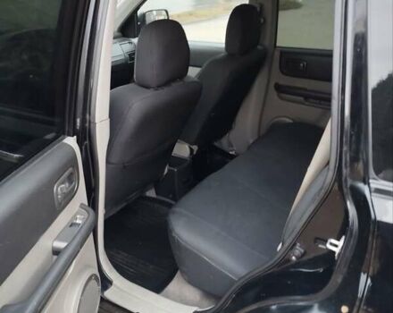 Черный Ниссан ИксТрейл, объемом двигателя 2.2 л и пробегом 373 тыс. км за 5800 $, фото 8 на Automoto.ua