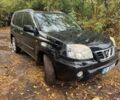 Черный Ниссан ИксТрейл, объемом двигателя 2.2 л и пробегом 220 тыс. км за 3500 $, фото 1 на Automoto.ua