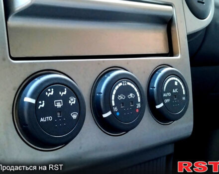 Черный Ниссан ИксТрейл, объемом двигателя 2 л и пробегом 200 тыс. км за 6200 $, фото 12 на Automoto.ua