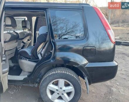 Черный Ниссан ИксТрейл, объемом двигателя 2 л и пробегом 250 тыс. км за 6500 $, фото 3 на Automoto.ua