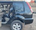 Черный Ниссан ИксТрейл, объемом двигателя 2 л и пробегом 250 тыс. км за 6500 $, фото 3 на Automoto.ua