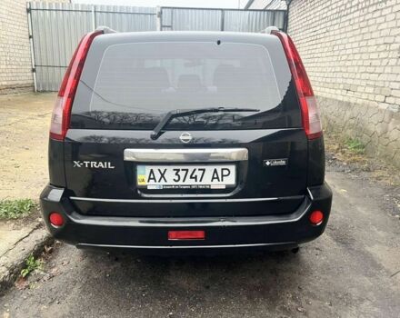 Черный Ниссан ИксТрейл, объемом двигателя 2 л и пробегом 150 тыс. км за 7700 $, фото 1 на Automoto.ua