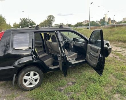 Черный Ниссан ИксТрейл, объемом двигателя 2.2 л и пробегом 252 тыс. км за 3600 $, фото 7 на Automoto.ua