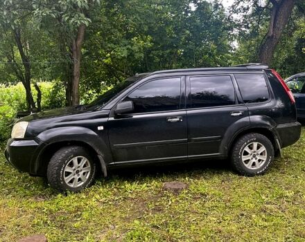 Черный Ниссан ИксТрейл, объемом двигателя 2.2 л и пробегом 360 тыс. км за 3500 $, фото 1 на Automoto.ua