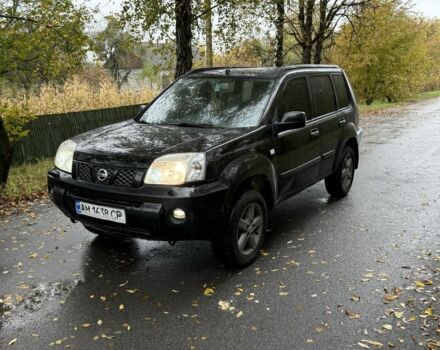Черный Ниссан ИксТрейл, объемом двигателя 2 л и пробегом 200 тыс. км за 3600 $, фото 1 на Automoto.ua