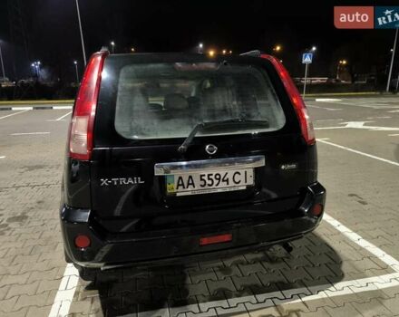 Черный Ниссан ИксТрейл, объемом двигателя 2.49 л и пробегом 128 тыс. км за 7500 $, фото 3 на Automoto.ua