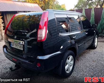 Черный Ниссан ИксТрейл, объемом двигателя 2 л и пробегом 200 тыс. км за 6200 $, фото 3 на Automoto.ua