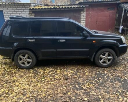 Черный Ниссан ИксТрейл, объемом двигателя 2.2 л и пробегом 397 тыс. км за 3700 $, фото 2 на Automoto.ua