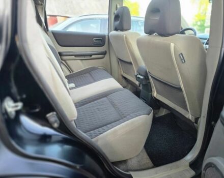 Черный Ниссан ИксТрейл, объемом двигателя 2.2 л и пробегом 290 тыс. км за 4500 $, фото 18 на Automoto.ua