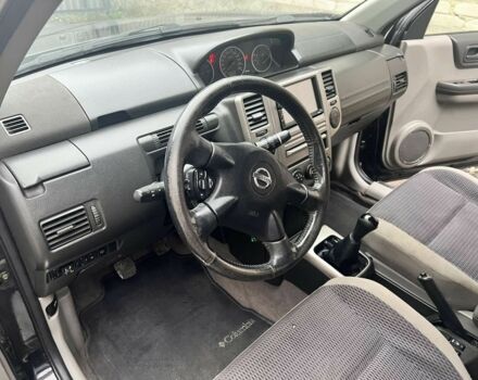 Черный Ниссан ИксТрейл, объемом двигателя 2 л и пробегом 150 тыс. км за 7700 $, фото 5 на Automoto.ua