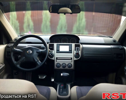 Черный Ниссан ИксТрейл, объемом двигателя 2 л и пробегом 200 тыс. км за 6200 $, фото 6 на Automoto.ua